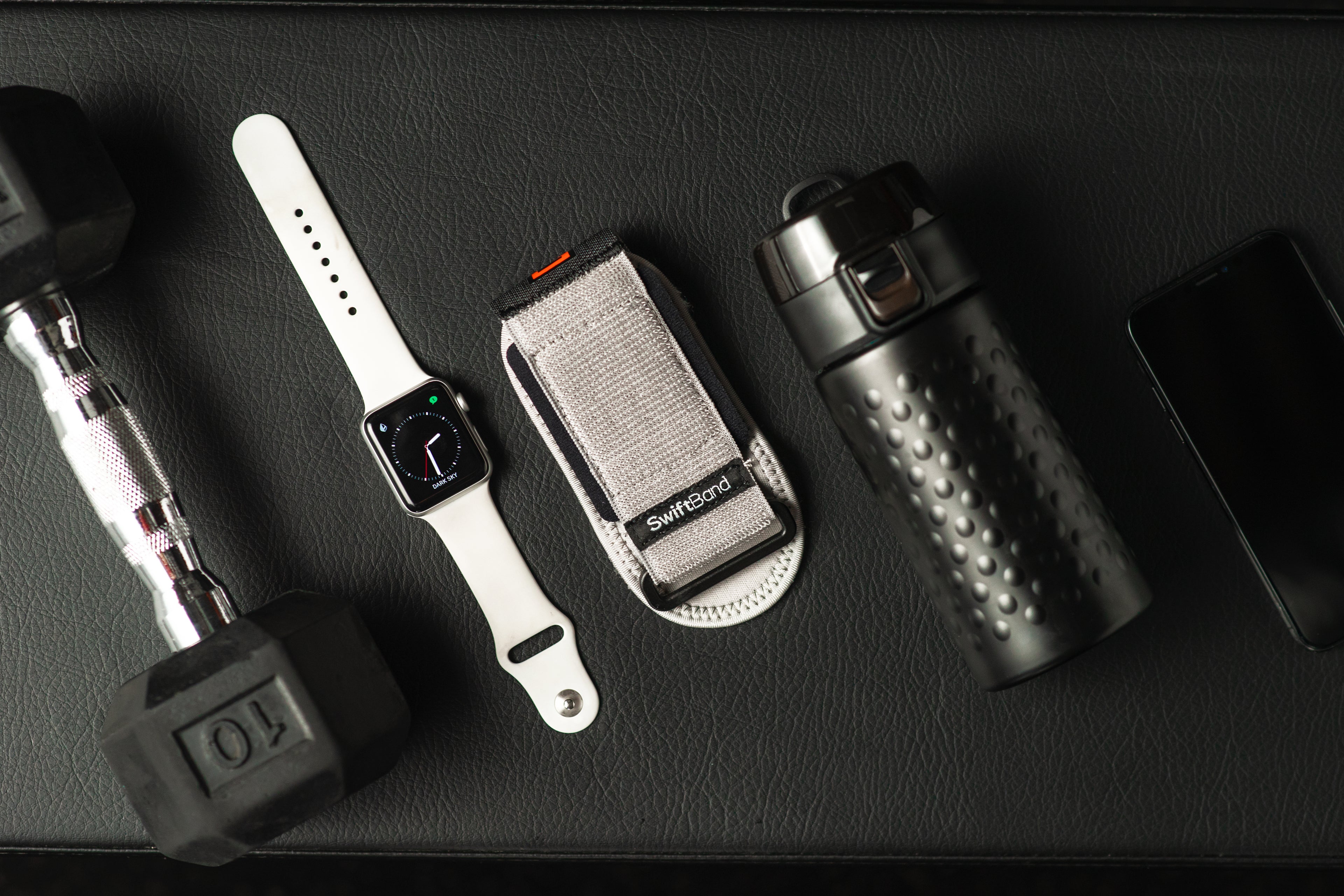 gym accessories used to represent the usage of the swiftband watch protector product